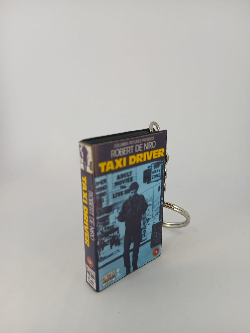 Taxi Driver VHS keyring — front cover standing