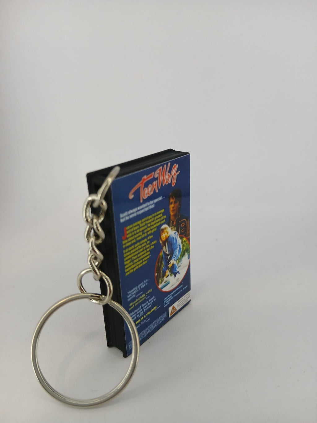 Teen Wolf VHS keyring — back and spine angled view standing