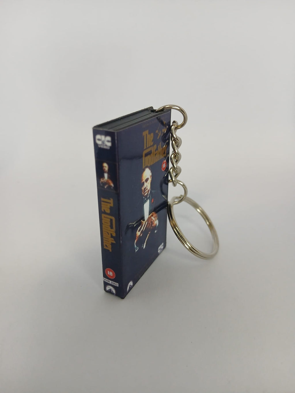 The Godfather Mini VHS Keyring – front with coin standing