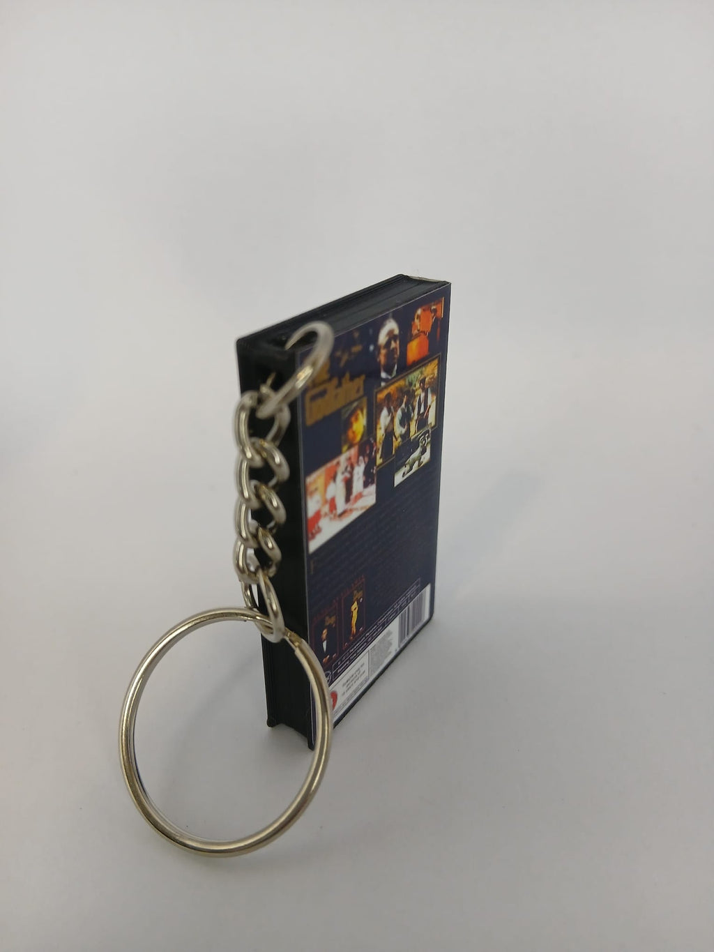The Godfather Mini VHS Keyring – flat lay overhead