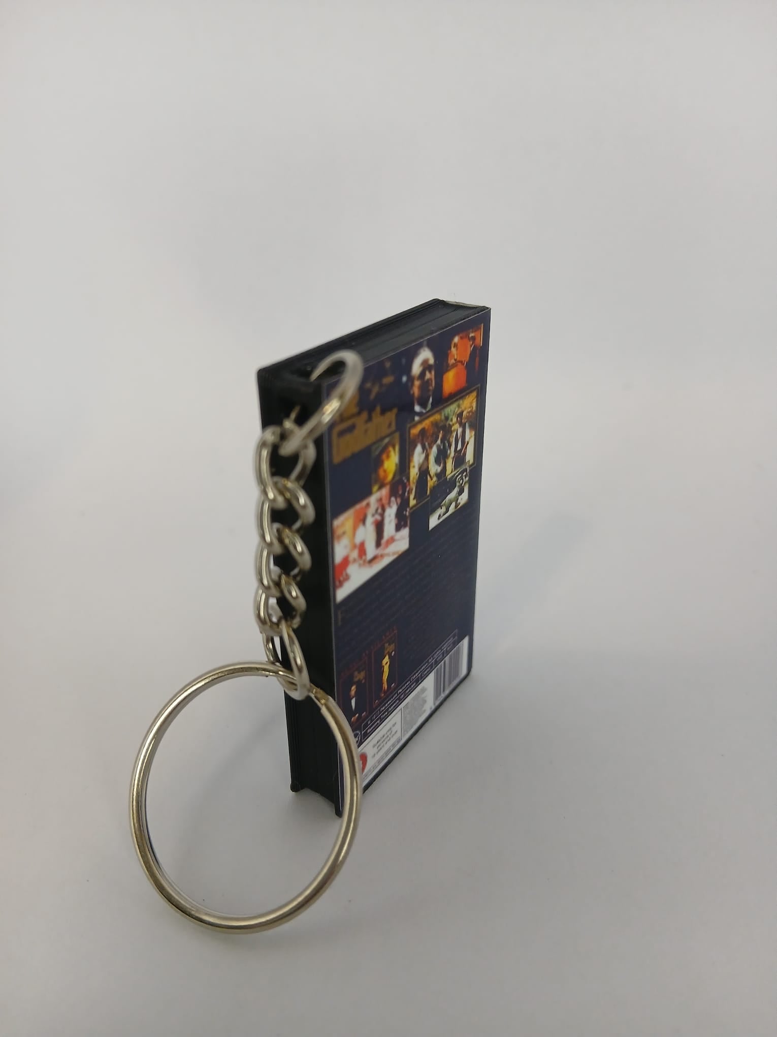 The Godfather Mini VHS Keyring – flat lay overhead
