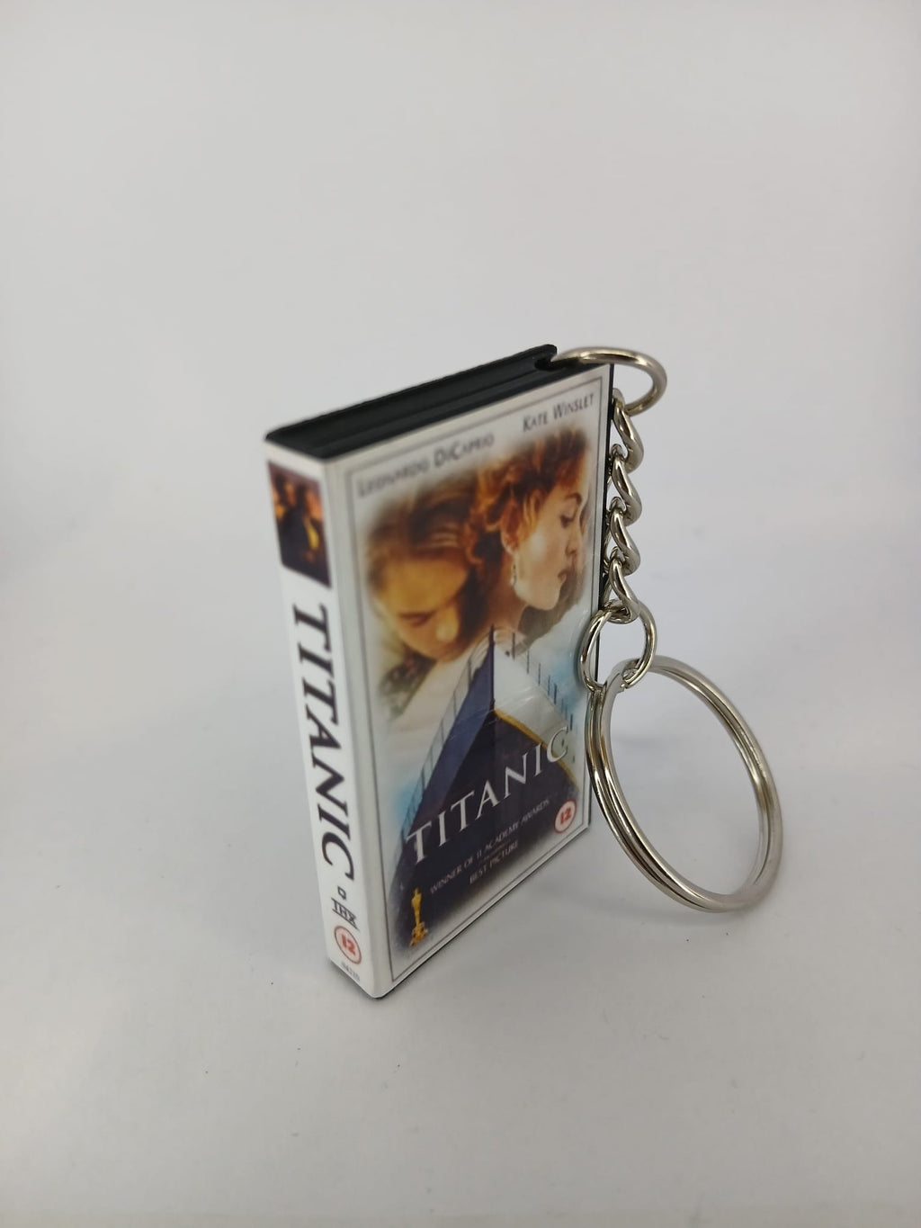Titanic VHS keyring — back and spine angled view standing