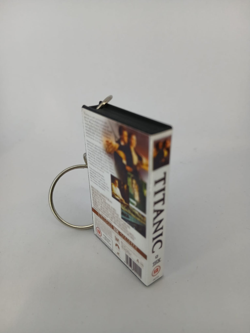 Titanic VHS keyring — spine view standing