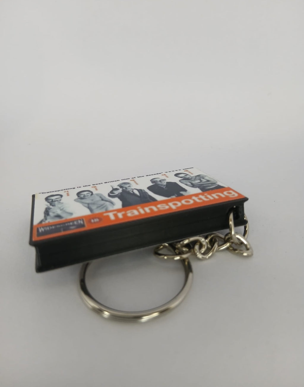 Trainspotting Mini VHS Keyring – flat lay overhead
