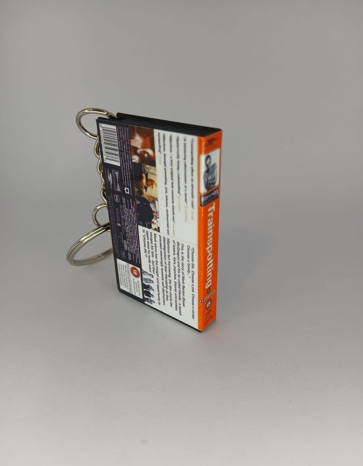 Trainspotting Mini VHS Keyring – front with coin