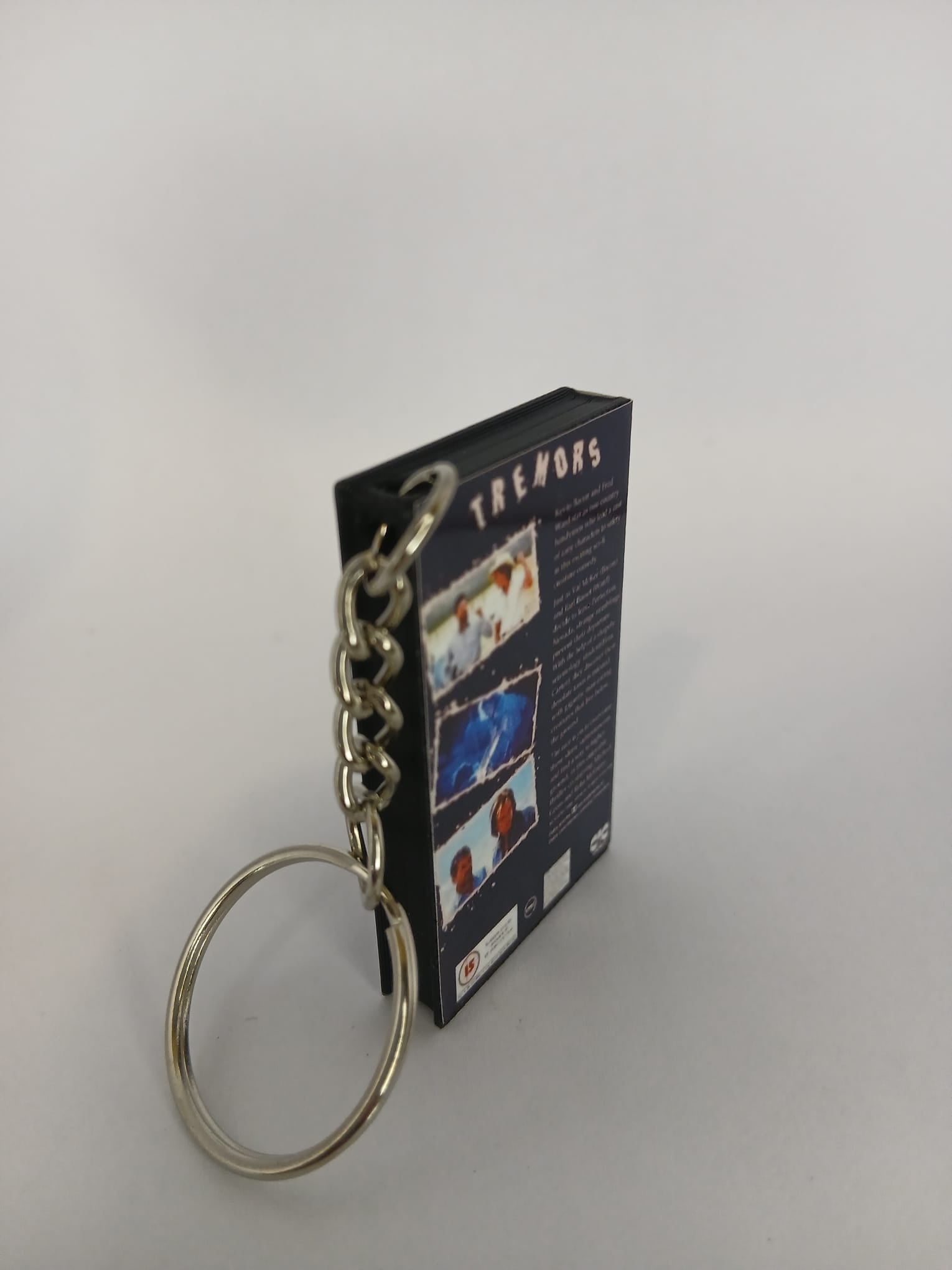 Tremors Mini VHS Keyring – front angle standing