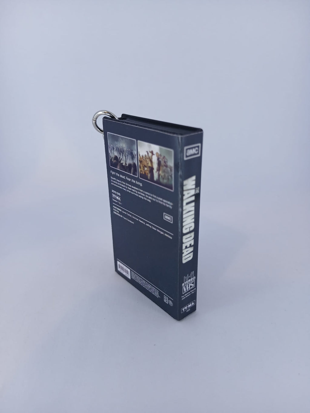 The Walking Dead VHS keyring — front and spine flat lay angled