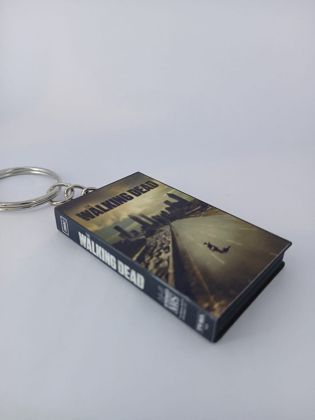 The Walking Dead VHS keyring — front cover standing