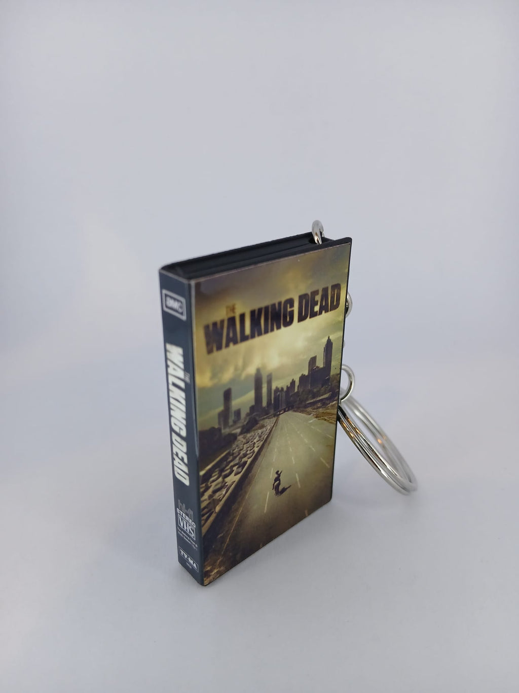 The Walking Dead VHS keyring — front cover close-up angled