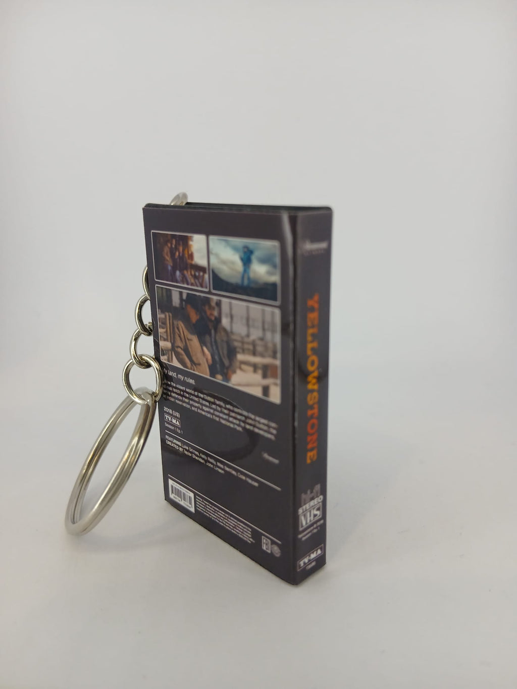 Yellowstone VHS keyring — front and spine flat lay angled