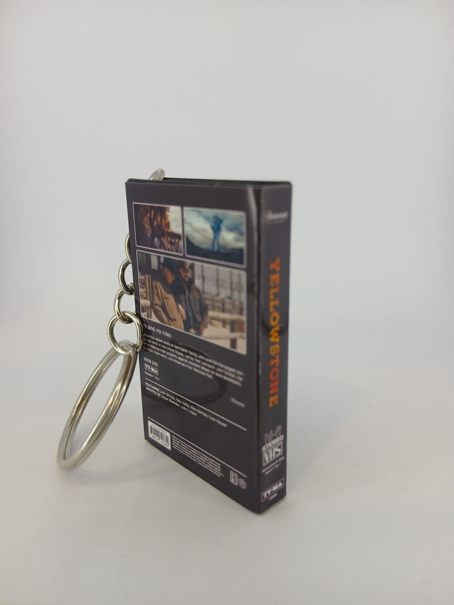 Yellowstone VHS keyring — front and spine flat lay angled