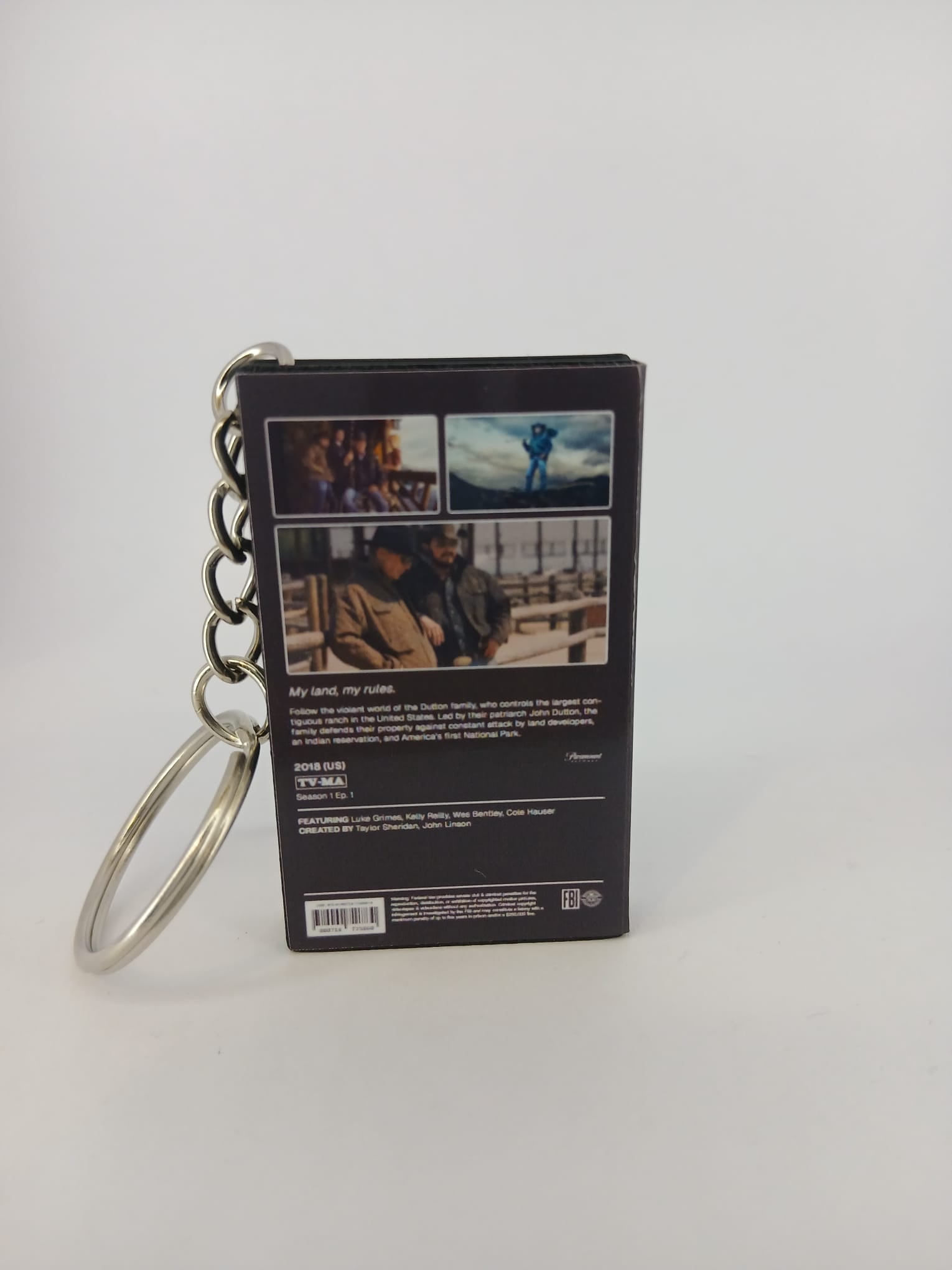 Yellowstone VHS keyring — front cover standing angled